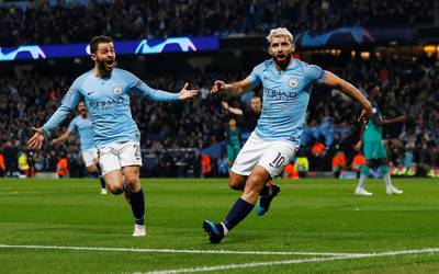 Manchester City's Sergio Aguero celebrates scoring City's fourth goal with Bernardo Silva, who earlier had made it 3-1 to City on the night. Reuters