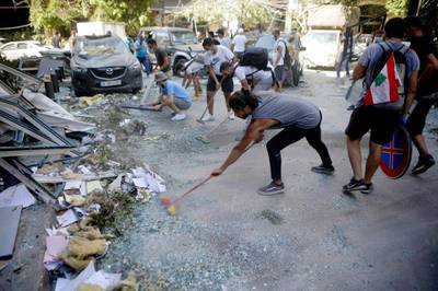 Lebanese activists take part in a campaign to clean the damaged neighbourhood of Mar Mikhael.  AFP