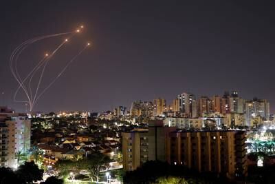 Streaks of light seen from Ashkelon in Israel as rockets fired from the Gaza Strip are intercepted. Reuters