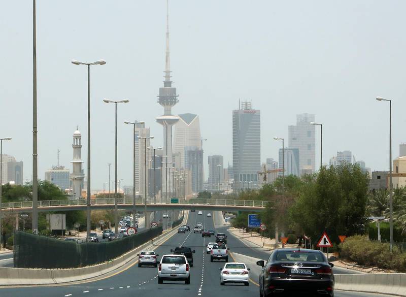 Vehicles drive down a highway in the Kuwaiti capital Kuwait City on May 31, 2020, after authorities eased some of the restrictive measures put in place during the coronavirus pandemic crisis.  / AFP / YASSER AL-ZAYYAT
