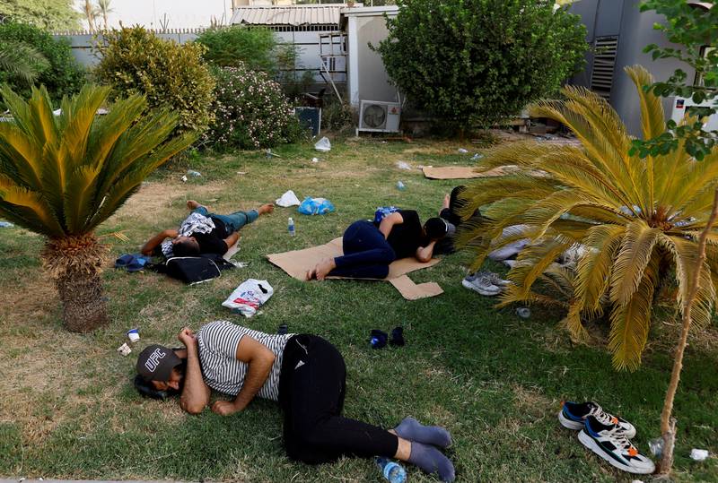 Moqtada Al Sadr supporters sleeping in the grounds of the Iraqi parliament building complex in Baghdad. Reuters
