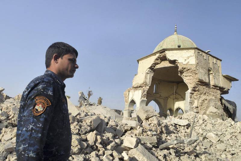 September 28, 2017 - Mosul, Iraq: The ruins of the Great Mosque al-Nuri, from which Islamic State leader Abu Bakr Al-Baghdadi declared a new caliphate in July 2014. Les ruines de la grande mosquee al-Nouri de Mossoul, un lieu symbolique dans la lutte contre Daesh car c'est ici que Abou Bakr al-Baghdadi avait proclame un nouveau califat en Juillet 2014. Apres la reprise de la ville, la mosquee a ete recouverte de slogans et d'insultes contre les jihadistes de l'organisation Etat islamique.NO USE FRANCE