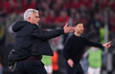 Roma coach Jose Mourinho gives his players instructions during the Europa League semi-final first leg against Bayer Leverkusen at Stadio Olimpico in Rome. Roma won the match 1-0. AFP
