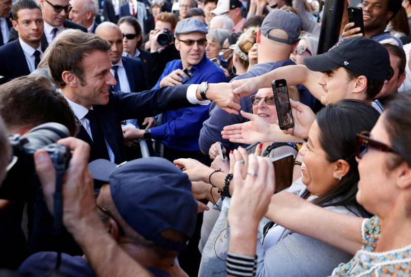 Mr Macron was mobbed by well-wishers on the streets of New Orleans. AFP