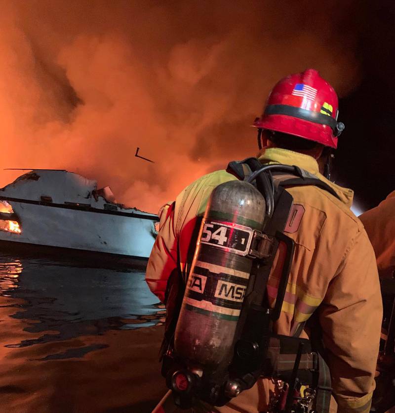 In this photo released by the Ventura County Fire Department on September 2, 2019, Firefighters attempt to extinguish a fire on a boat off the coast of Santa Cruz Island, California. Rescuers were scrambling Monday to reach more than 30 people who were sleeping below deck when their scuba-diving boat caught fire off the California coast, with reports of "numerous fatalities." A major rescue operation was underway for the dozens of people trapped aboard the 75-foot (22-meter) boat, near Santa Cruz Island off the coast from Los Angeles, the Coast Guard tweeted.
 - RESTRICTED TO EDITORIAL USE - MANDATORY CREDIT "AFP PHOTO / Ventura County Fire Department/ HO" - NO MARKETING NO ADVERTISING CAMPAIGNS - DISTRIBUTED AS A SERVICE TO CLIENTS


 / AFP / Ventura County Fire Department / HO / RESTRICTED TO EDITORIAL USE - MANDATORY CREDIT "AFP PHOTO / Ventura County Fire Department/ HO" - NO MARKETING NO ADVERTISING CAMPAIGNS - DISTRIBUTED AS A SERVICE TO CLIENTS


