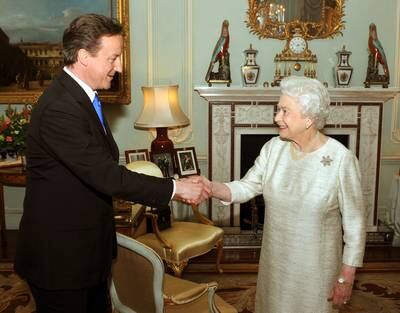 Queen Elizabeth greets David Cameron at Buckingham Palace for an audience to invite him to be the next Prime Minister, in May 2010.  Getty Images