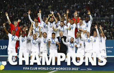 Real Madrid players celebrate with the Fifa Club World Cup trophy. Reuters