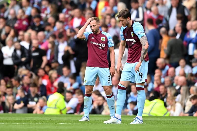 Burnley's Charlie Taylor and Wout Weghorst look dejected after the Newcastle's second goal. Getty