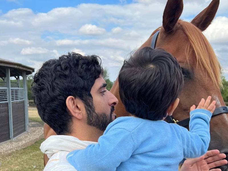 Sheikh Hamdan at the UK F3 stables with his son, Sheikh Rashid, earlier this year. Photo: @Fazza / Instagram