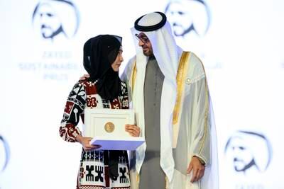 President Sheikh Mohamed presents the 2023 Zayed Sustainability Prize for East Asia & Pacific Global High Schools to a representative from Kamil Muslim College, Fiji. Photo: Presidential Court