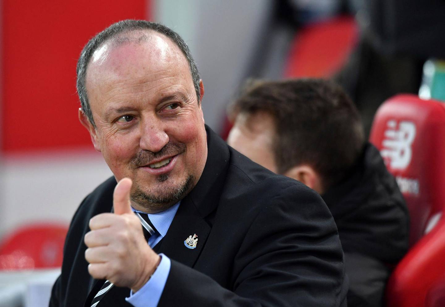 Newcastle United manager Rafael Benitez gestures prior to the English Premier League soccer match between Liverpool and Newcastle United,  at Anfield, in Liverpool, England, Saturday March 3, 2018. (Anthony Devlin/PA via AP)