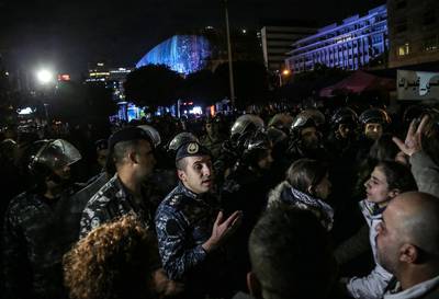 Lebanese policemen surround and protected the tent of Lokman Slim after a clash with the protesters during a dialogue meeting in downtown beirut, Lebanon.  EPA