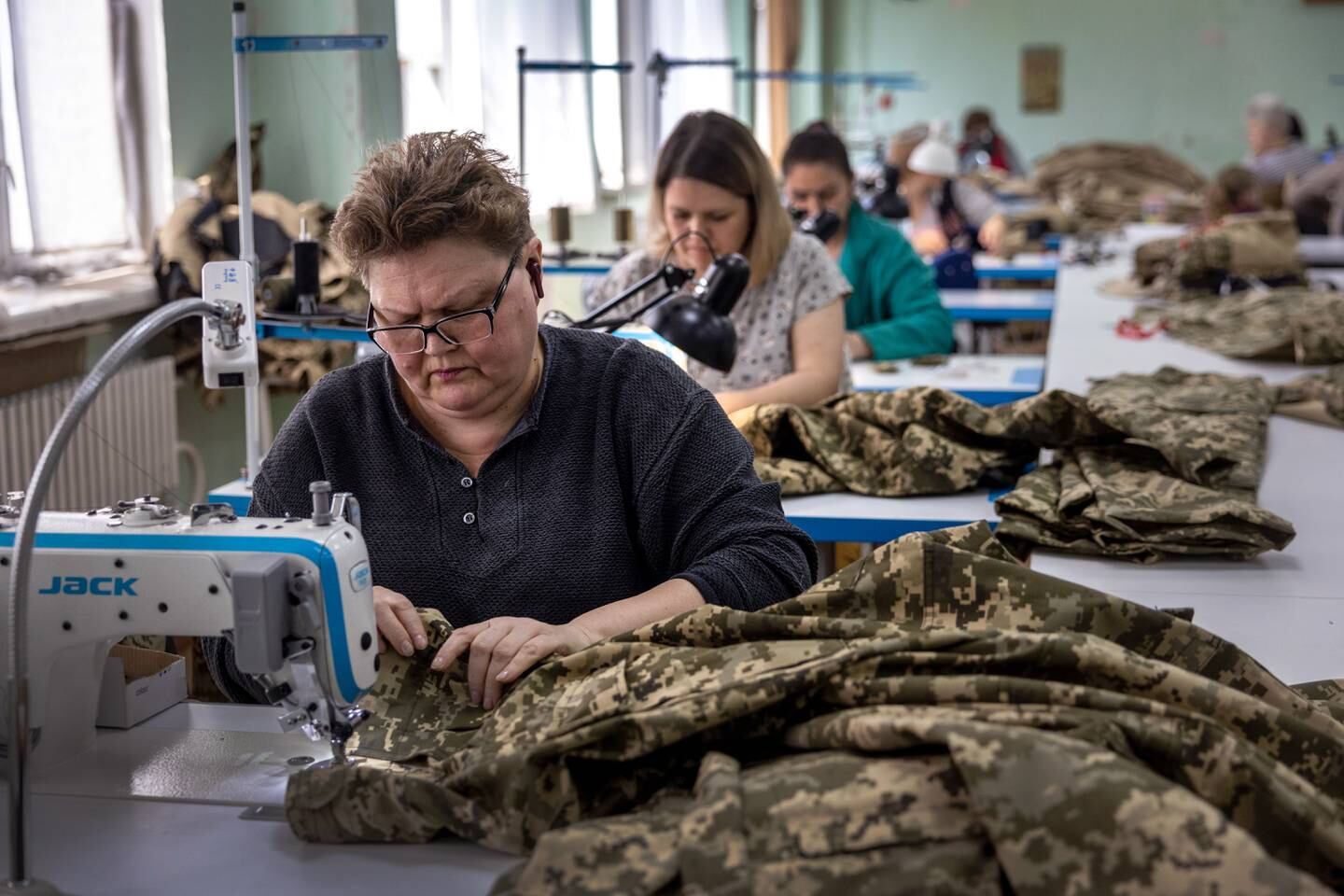 Workers sew uniforms and material for flack jackets at a military clothing factory in May in Kryvyi Rih, Ukraine. Getty