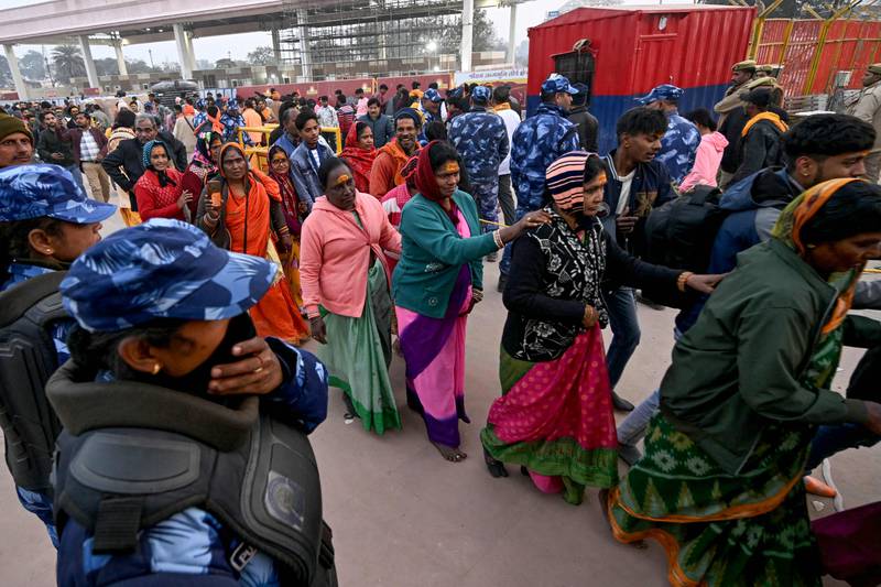 Security staff monitor queues of worshippers waiting to enter the Ram Temple in Ayodhya on Tuesday. AFP