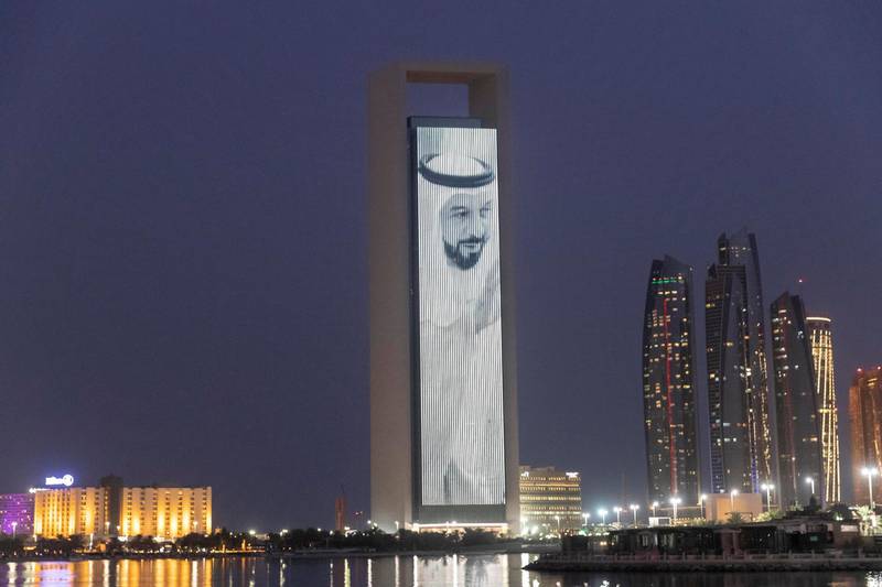 An image of Sheikh Khalifa is projected on to a building in Abu Dhabi. Antonie Robertson / The National