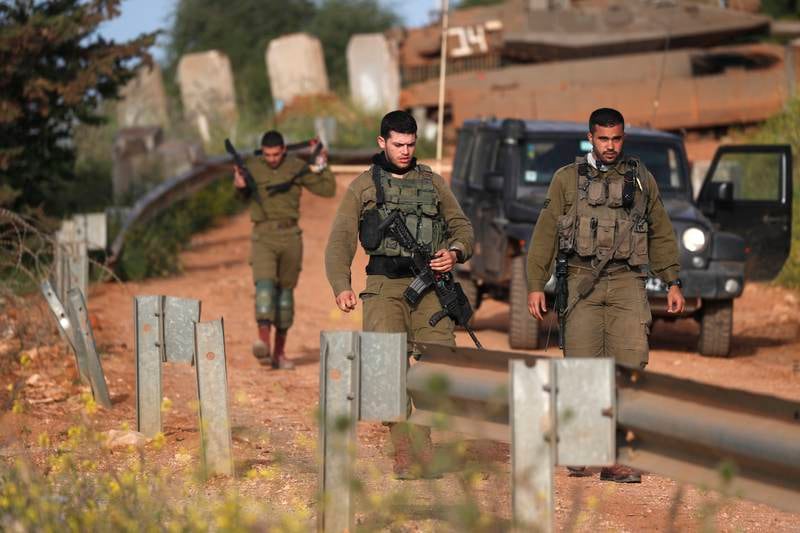 Israeli soldiers near the Israel-Lebanon border next to Avivim settlement in north of Israel. EPA 