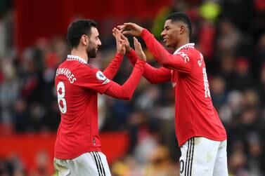 MANCHESTER, ENGLAND - JANUARY 14: Marcus Rashford and Bruno Fernandes of Manchester United celebrate following their side's victory in the Premier League match between Manchester United and Manchester City at Old Trafford on January 14, 2023 in Manchester, England. (Photo by Shaun Botterill / Getty Images)