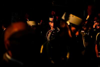 Royal Guard members gather in Madrid, Spain, for a military parade on the national holiday known as Hispanic Day. AP