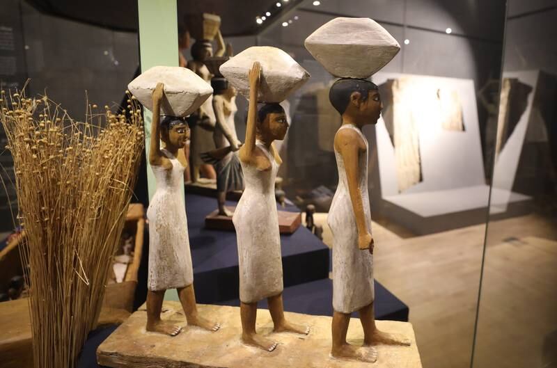 Three females statues carrying offerings on display after the opening of the Textile gallery hall at the National Museum of Egyptian Civilization in Old Cairo, Egypt, 19 April 2022.   EPA / KHALED ELFIQI
