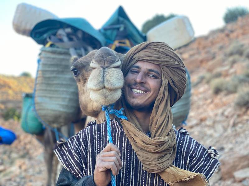 Guide Addi with camel Farquhar. Courtesy Alice Morrison