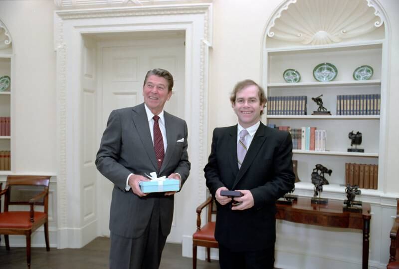 President Reagan met with Elton John in 1982. Getty Images