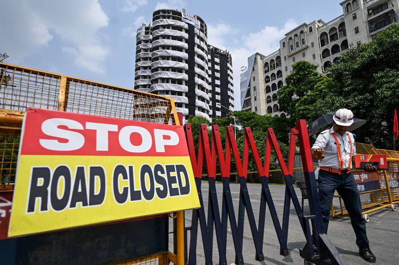 Police barricades went up in Noida as time for the Twin Towers to come down grew closer. AFP