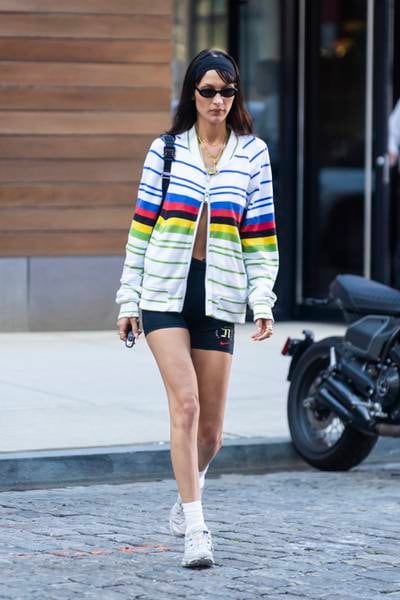 Model Bella Hadid mixes statement and slimline stripes while out running errands in New York. Getty Images