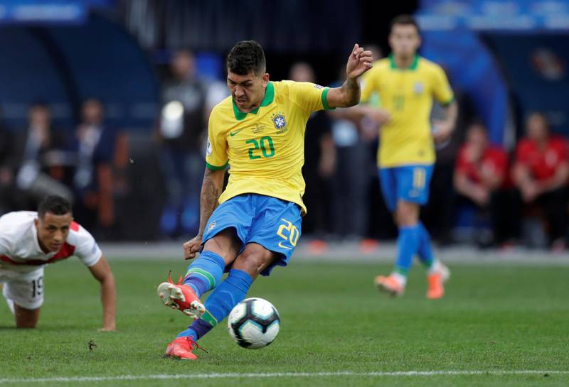 Brazil's Roberto Firmino shoots at goal. Reuters