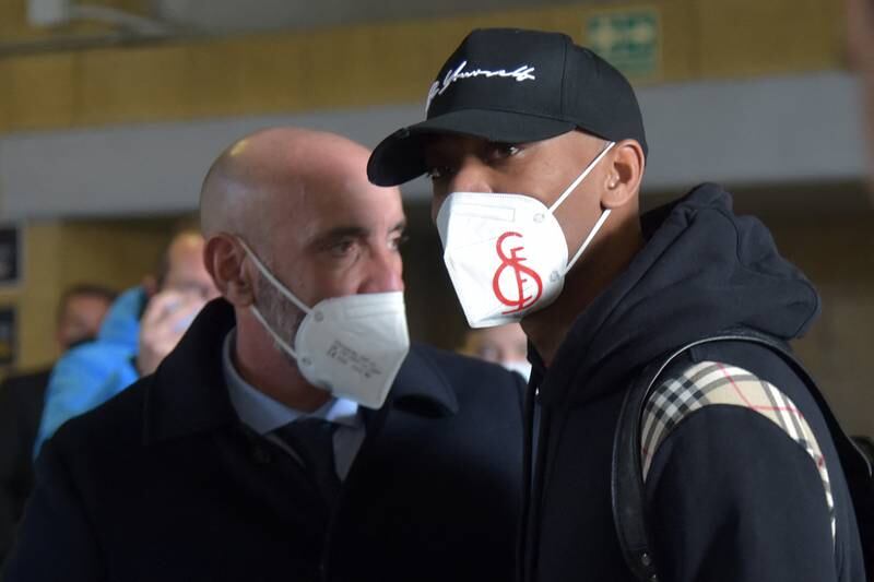 Anthony Martial with Sevilla sports director Monchi, upon his arrival in Seville. AFP