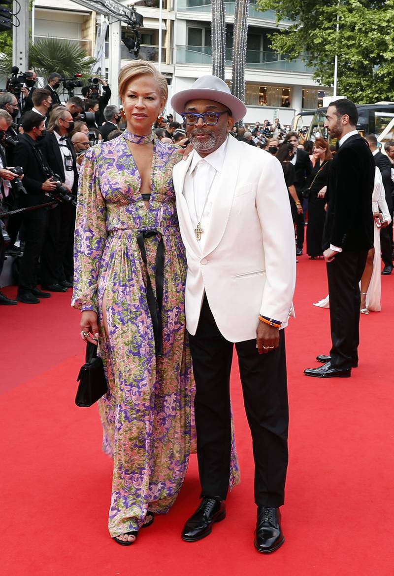 Spike Lee and Tonya Lewis Lee attends the screening of 'The French Dispatch' at the 74th annual Cannes Film Festival on July 12, 2021