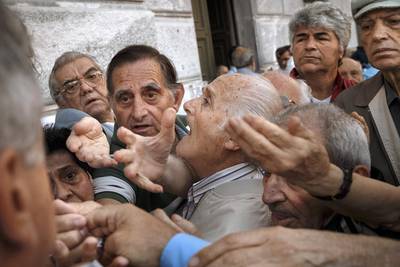 During the Greek debt crisis in 2015, pensioners were unable to get hold of their money. Its future depends on its creditors working together. Daniel Ochoa de Olza / AP Photo