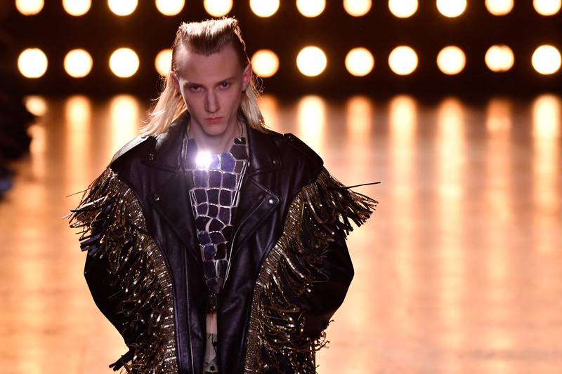 Another shimmery jacket on the catwalk. AFP