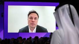 Elon Musk says Twitter deal still has 'unresolved matters' and clarifies Tesla job cuts