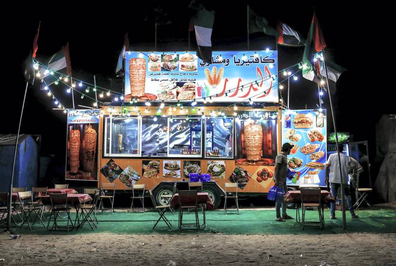 Abu Dhabi, United Arab Emirates, December 10, 2019.    --A pop-up Syrian shawarmah restaurant on Millions Street at the Al Dhafra Festival.Victor Besa/The NationalSection:  NAReporter:  Anna Zacharias