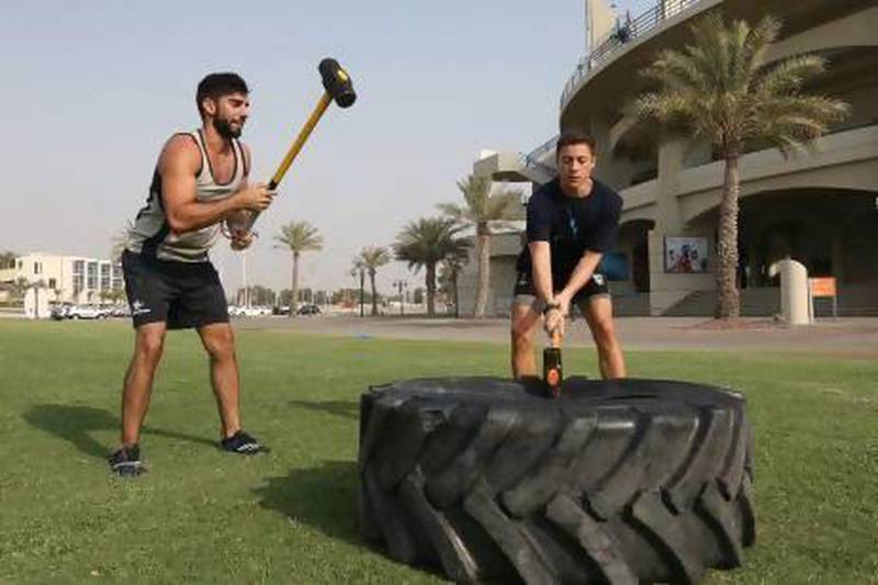 Emirati personal trainer, Hamdan Khouri, left, says if  people are not able to improve their fitness during Ramadan, they should at least try to maintain it. “If you’re eating smart and training smart, that’s the best you can do,” he says. Fatima Al Marzooqi / The National