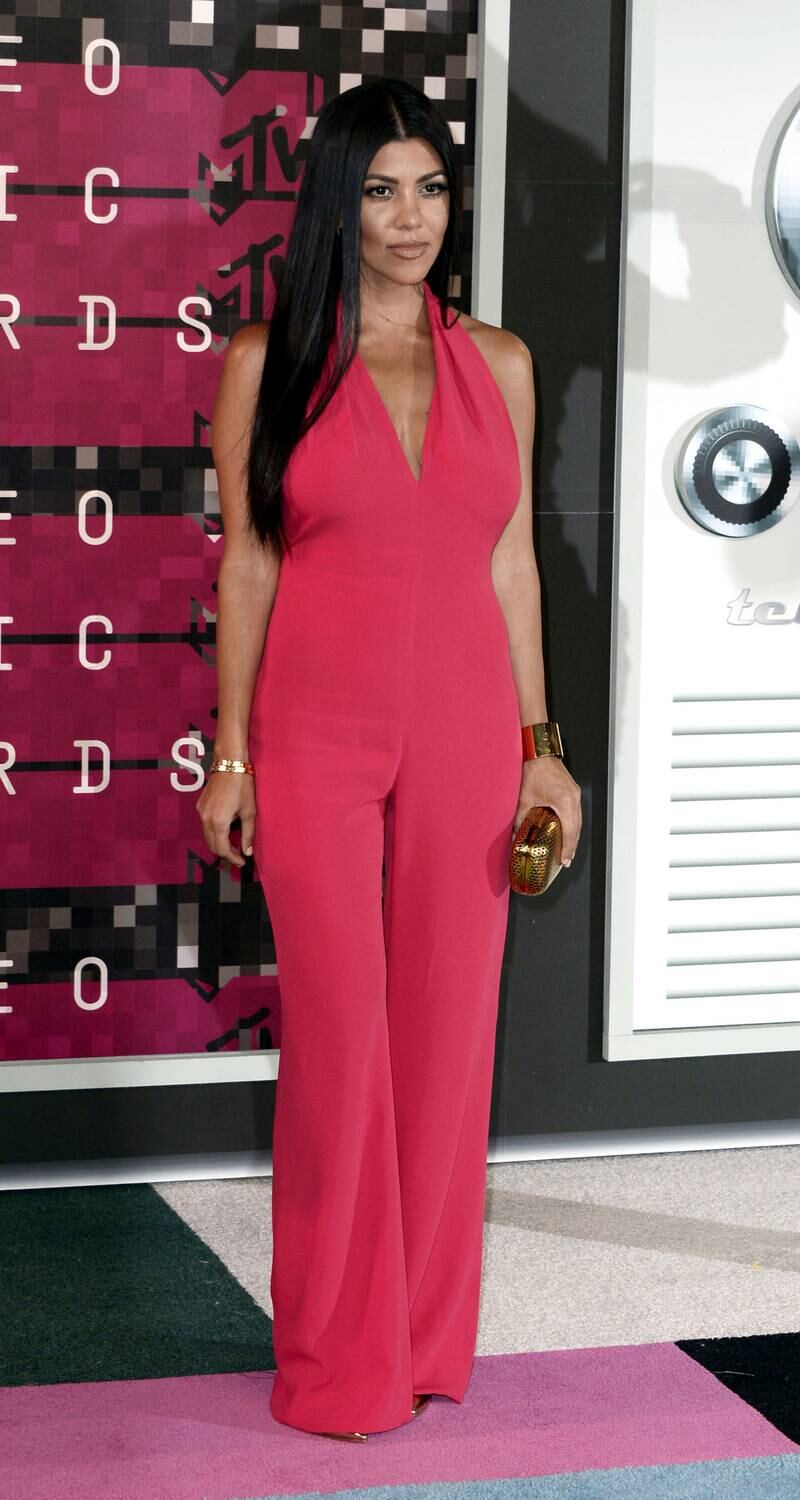 Kourtney Kardashian, in red Balmain, arrives at the 32nd MTV Video Music Awards at the Microsoft Theatre in Los Angeles on August 30, 2015. EPA
