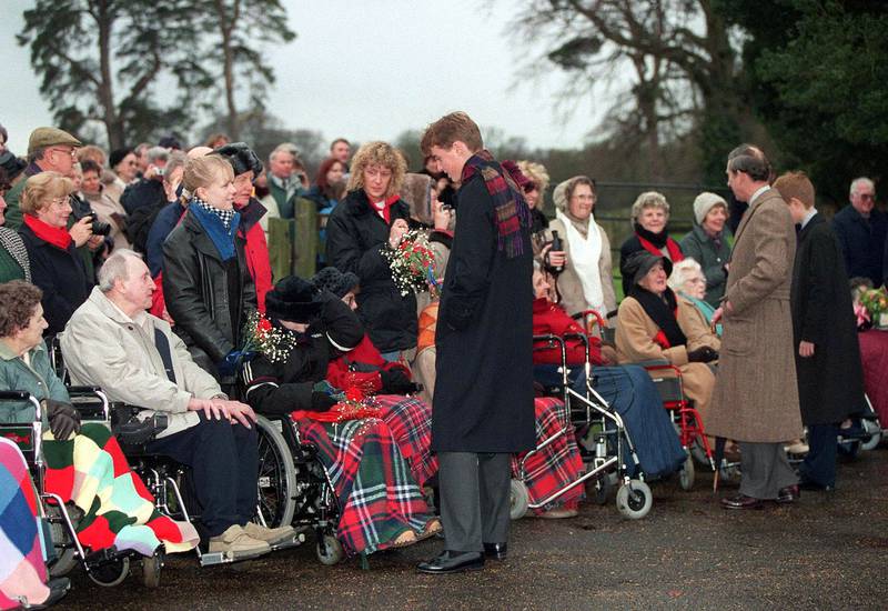 1998: Prince William and Prince Charles meet the public after the Christmas Day church service at Sandringham. Getty Images