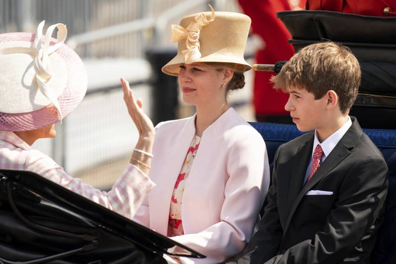 Viscount Severn and Lady Louise Windsor ride in a carriage outside Buckingham Palace in June.  AP