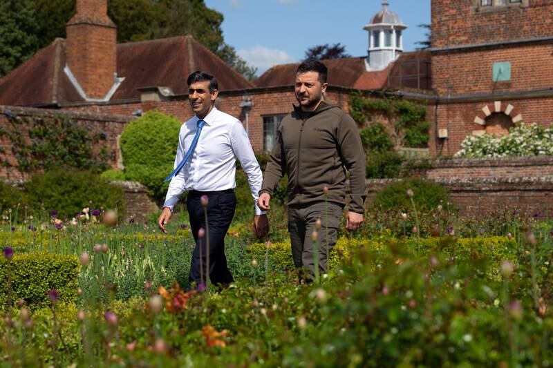Britain's Prime Minister, Rishi Sunak, and Ukraine's President, Volodymyr Zelenskyy, walk in the garden at Chequers. Getty Images