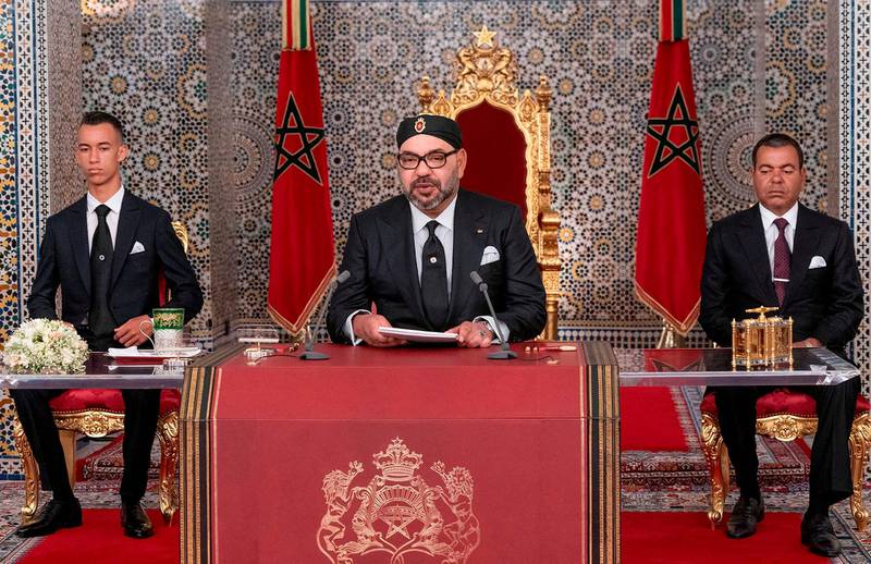 This handout picture provided by the Moroccan Royal Palace on July 29, 2019 shows Morocco's King Mohammed VI (C) delivering a speech marking the 20th anniversary of his accession to the throne, with his brother Prince Moulay Rachid (R) and son Prince Moulay Hassan (L) seated alongside him, in the northern city of Tetouan overlooking the Mediterranean. == RESTRICTED TO EDITORIAL USE - MANDATORY CREDIT "AFP PHOTO /HO/ MOROCCAN ROYAL PALACE" - NO MARKETING NO ADVERTISING CAMPAIGNS - DISTRIBUTED AS A SERVICE TO CLIENTS ==
 / AFP / MAP / - / == RESTRICTED TO EDITORIAL USE - MANDATORY CREDIT "AFP PHOTO /HO/ MOROCCAN ROYAL PALACE" - NO MARKETING NO ADVERTISING CAMPAIGNS - DISTRIBUTED AS A SERVICE TO CLIENTS ==
