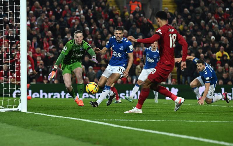 Cody Gakpo scores Liverpool's second goal against Everton. AFP