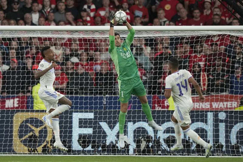 Real goalkeeper Thibaut Courtois catches a cross. AP