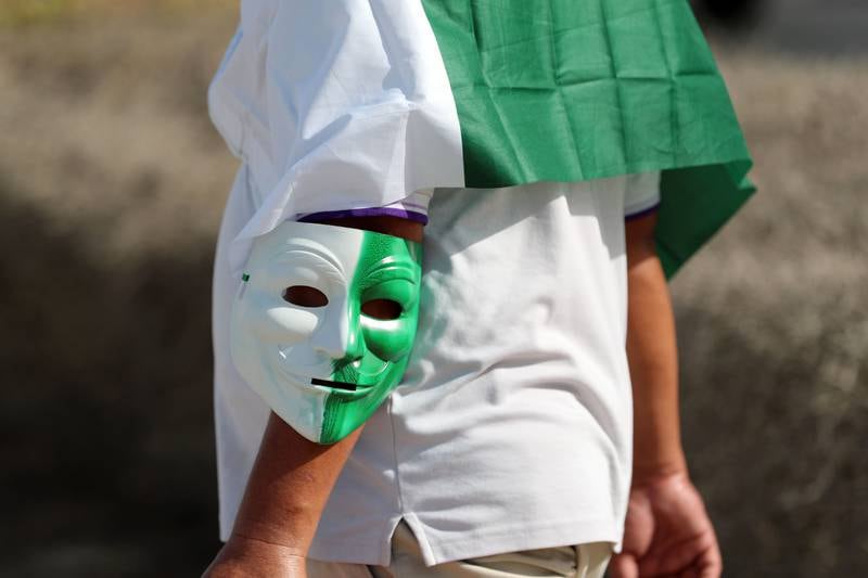 A Pakistan fan arrives for the game.
