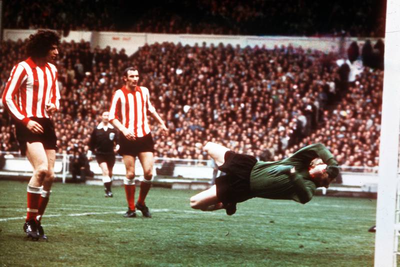 Sunderland goalkeeper Jim Montgomery makes his spectacular double save, this one from the feet of Peter Lorimer after he had already saved Trevor Cherry's close range diving header, during the 1973 FA Cup final. Getty Images