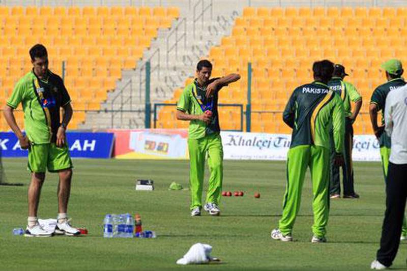 Pakistan players feel the heat during their training session at Zayed Cricket Stadium in Abu Dhabi on Sunday.