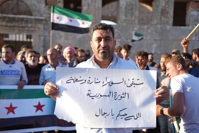 Demonstrators resurrected chants that featured in the 2011 revolt against President Bashar Al Assad on Thursday. EPA