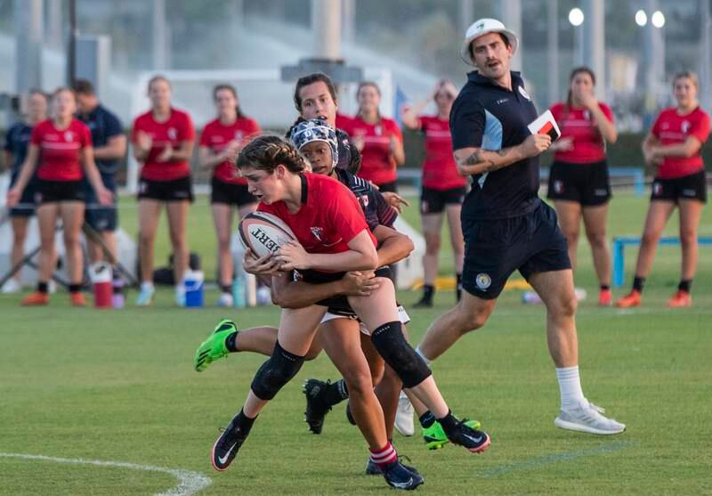 A Dubai English Speaking College player is tackled. Ruel Pableo for The National