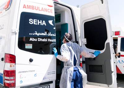 ABU DHABI, UNITED ARAB EMIRATES. MAY 2020.Consultant physician at the emergency department in Sheikh Khalifa Medical City, receives a COVID 19 patient that have arrived in an ambulance. (Photo: Reem Mohammed/The National)Reporter:Section: