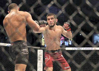 Abu Dhabi, United Arab Emirates - September 07, 2019: Lightweight bout between Davi Ramos and Islam Makhachev (red shorts, winner) in the Main card at UFC 242. Saturday the 7th of September 2019. Yas Island, Abu Dhabi. Chris Whiteoak / The National