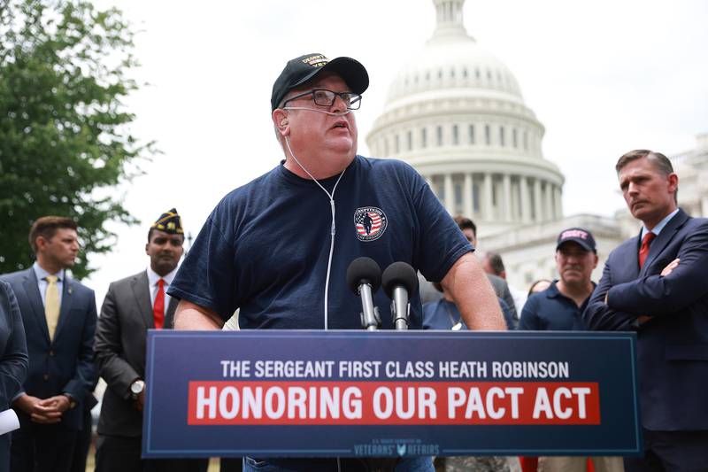Air Force veteran Tim Hauser speaks during Thursday's press conference. Getty Images / AFP
